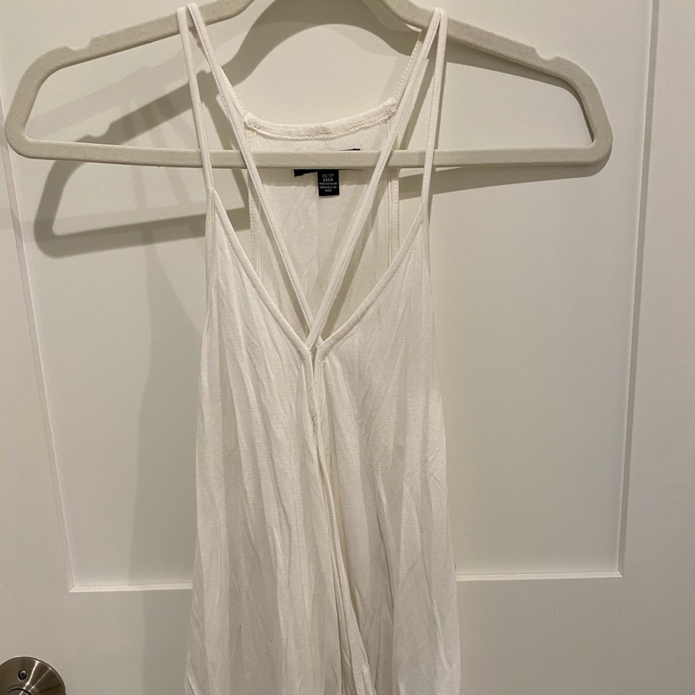 Women’s white tank top with cross V neck line